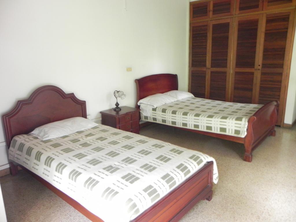 Hostal Tamarindo Итагуи Номер фото